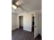 A modest bedroom featuring a ceiling fan, fresh paint, and a closet at 5123 Turnbull Dr, Orlando, FL 32812