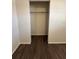 Bedroom closet featuring clean walls and hardwood flooring at 5123 Turnbull Dr, Orlando, FL 32812