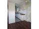 A kitchen featuring ample cabinet space and modern lighting fixtures at 5123 Turnbull Dr, Orlando, FL 32812