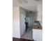 Efficient kitchen layout with modern appliances and tile flooring at 5123 Turnbull Dr, Orlando, FL 32812