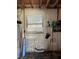 Storage room with concrete walls, exposed utilities, and window with blinds at 5123 Turnbull Dr, Orlando, FL 32812