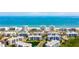 Aerial view of beachfront condo buildings and the expansive oceanfront at 5300 S Atlantic Ave # 6-502, New Smyrna Beach, FL 32169