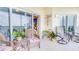 Relaxing balcony with ample seating and views of the surrounding natural landscape at 5300 S Atlantic Ave # 6-502, New Smyrna Beach, FL 32169