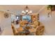 Cozy dining area with glass table and comfortable seating, perfect for enjoying meals with a view at 5300 S Atlantic Ave # 6-502, New Smyrna Beach, FL 32169