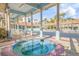 Relaxing hot tub area with covered seating, offering a resort-like experience in a peaceful setting at 5300 S Atlantic Ave # 6-502, New Smyrna Beach, FL 32169