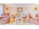 Inviting living room featuring comfortable seating, stylish decor, and plenty of natural light for relaxation and entertainment at 5300 S Atlantic Ave # 6-502, New Smyrna Beach, FL 32169