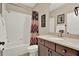 Clean bathroom featuring a shower-tub combo with a decorative curtain and modern vanity at 5464 Factors Walk Dr, Sanford, FL 32771