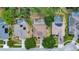 An aerial view showcasing the house and surrounding homes with private pools at 626 Green Rock Ct, Apopka, FL 32712