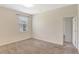Tranquil bedroom with window for natural light and plush carpeting throughout at 626 Green Rock Ct, Apopka, FL 32712