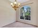 Dining room featuring a large window with private front yard views at 626 Green Rock Ct, Apopka, FL 32712