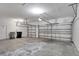 Spacious three car garage with ample lighting, new garage doors, and epoxy floors at 626 Green Rock Ct, Apopka, FL 32712