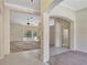 Spacious open floor plan featuring neutral walls and carpeted and tiled floors at 626 Green Rock Ct, Apopka, FL 32712
