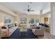 Bright living room with stylish furnishings, decor and sliding door access to the backyard at 626 Green Rock Ct, Apopka, FL 32712
