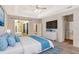 Spacious bedroom with tray ceiling, ceiling fan, and ensuite access at 626 Green Rock Ct, Apopka, FL 32712