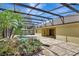 Screened in pool features a sundeck and beautiful landscaping at 626 Green Rock Ct, Apopka, FL 32712