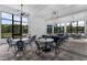The communal seating area offers a bright and social atmosphere with comfortable seating and scenic views at 7179 Cow Prairie Rd, St Cloud, FL 34773
