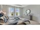 Stylish main bedroom featuring a decorative mirror and calming neutral tones at 7213 Nottingham Reel Ct, St Cloud, FL 34773