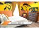 Themed bedroom with queen bed, television, dresser and safari themed artwork at 8101 Resort Village Dr # 31501, Orlando, FL 32821