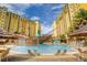 Beautiful community pool with pirate ship, water features, and lounge seating at 8101 Resort Village Dr # 31501, Orlando, FL 32821