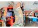 Enjoy a Jurassic Park themed arcade game in the home's exciting game room at 8101 Resort Village Dr # 31501, Orlando, FL 32821
