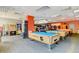Game room includes pool tables, arcade games and more at 8101 Resort Village Dr # 31501, Orlando, FL 32821