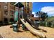 Neighborhood playground features climbing structures and slides, near complex at 8101 Resort Village Dr # 31501, Orlando, FL 32821