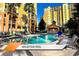 Relaxing reflection pool, lounge chairs and poolside cabana create a tranquil atmosphere at 8101 Resort Village Dr # 31501, Orlando, FL 32821