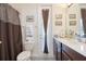 Bathroom featuring a vanity with solid surface counters and a shower with a curtain at 839 Timber Isle Dr, Orlando, FL 32828