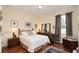 Cozy bedroom with hardwood floors, area rug, and traditional furniture at 839 Timber Isle Dr, Orlando, FL 32828