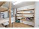 Functional storage room with shelving, perfect for organizing household items at 839 Timber Isle Dr, Orlando, FL 32828