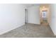 Bright bedroom featuring neutral carpeting and ample natural light, perfect for relaxation at 942 Jackson Ave, Davenport, FL 33837