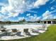 Resort-style community pool with ample lounging chairs and shade, perfect for relaxation at 942 Jackson Ave, Davenport, FL 33837