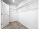 Walk-in closet featuring carpet and wire shelving at 942 Jackson Ave, Davenport, FL 33837