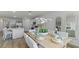 Elegant dining area with modern decor, stylish table settings, and an open flow into the kitchen at 1028 Morfontaine St, Daytona Beach, FL 32124