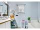 Bathroom with single vanity, framed mirror and neutral paint at 1116 Adirondack St, Deltona, FL 32725
