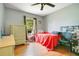 Bedroom features hardwood floors and a window at 1116 Adirondack St, Deltona, FL 32725