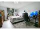 Bedroom with window, ceiling fan, and desk setup featuring dual monitors at 1116 Adirondack St, Deltona, FL 32725