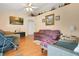 Welcoming living room featuring hardwood floors, neutral walls, and comfortable seating at 1116 Adirondack St, Deltona, FL 32725