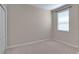 Cozy bedroom with neutral carpeting and a bright window at 11968 Sands Cv, Orlando, FL 32828