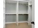 Organized walk-in closet with built-in shelving, providing ample storage space at 123 Tangelo Court, Maitland, FL 32751