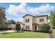 Beautiful home showcasing the well-maintained landscaping and classic architecture at 123 Tangelo Court, Maitland, FL 32751