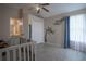 Cozy Bedroom with neutral walls, hardwood floors, and themed wall art at 12618 Greco Dr, Orlando, FL 32824