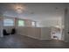 Upstairs loft space with hardwood floors, neutral paint and views of the staircase at 12618 Greco Dr, Orlando, FL 32824