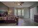 Spacious main bedroom with hard wood flooring and large windows at 12618 Greco Dr, Orlando, FL 32824