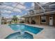 Private screened-in pool with hot tub and covered patio ideal for outdoor living and entertaining at 12618 Greco Dr, Orlando, FL 32824
