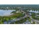 Scenic aerial view showcasing the community's lakes, lush landscaping, and residential homes at 14231 Sonco Ave, Windermere, FL 34786