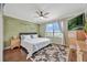 This stunning main bedroom is complete with a ceiling fan, natural light, and a beautiful view at 14231 Sonco Ave, Windermere, FL 34786