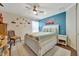bedroom with a ceiling fan, decorated walls and carpet at 14231 Sonco Ave, Windermere, FL 34786