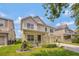 Charming two-story home featuring a welcoming front porch and a two-car garage at 14231 Sonco Ave, Windermere, FL 34786