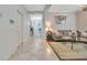 Elegant foyer with decorative tile flooring, leading to the living area and front door at 14231 Sonco Ave, Windermere, FL 34786